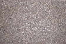 sandgrauer farbiger Asphalt